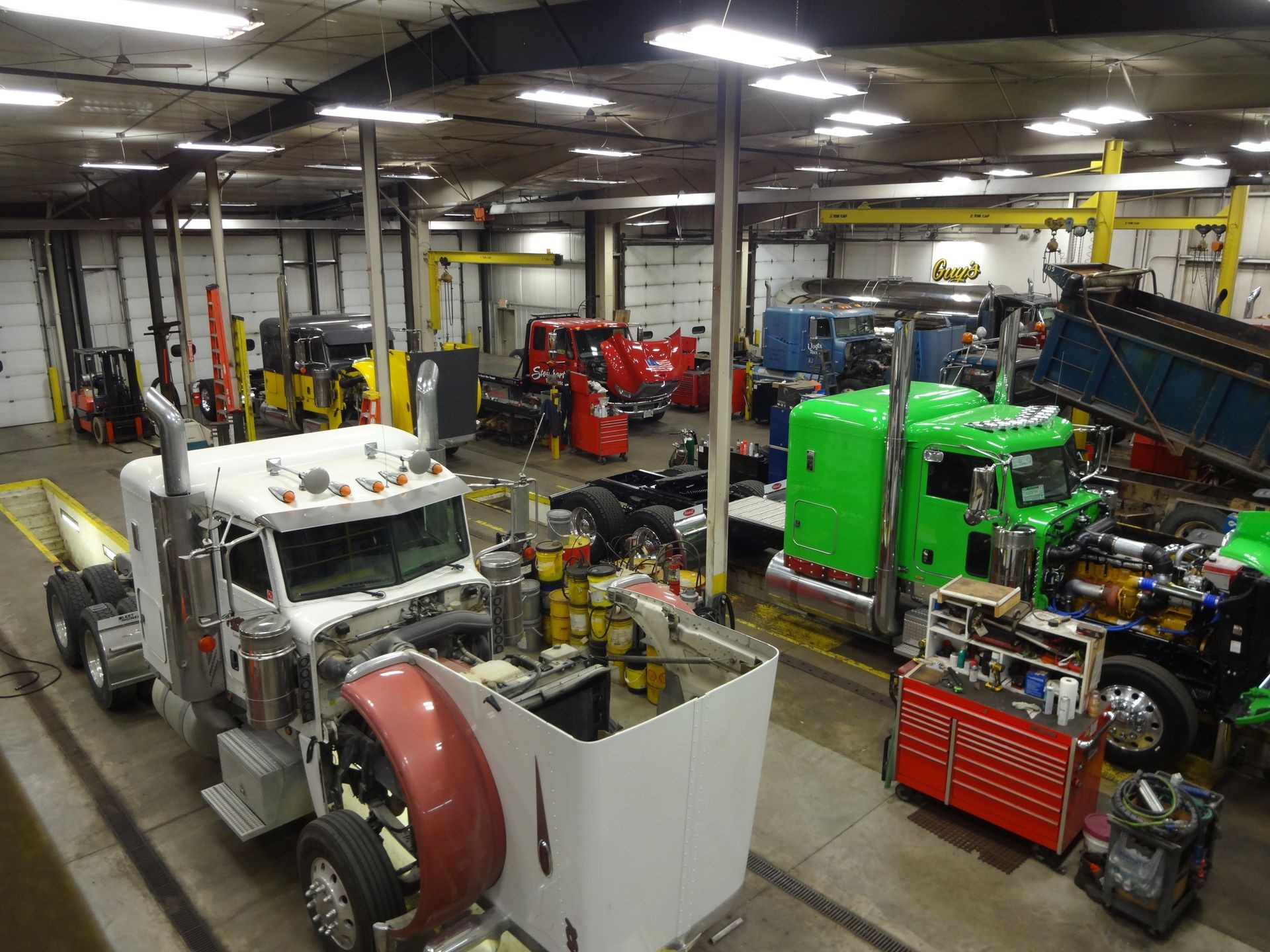 Interior of our Woodstock body shop, where our skilled technicians perform truck body repairs, painting, and diagnostics to keep trucks on the road.